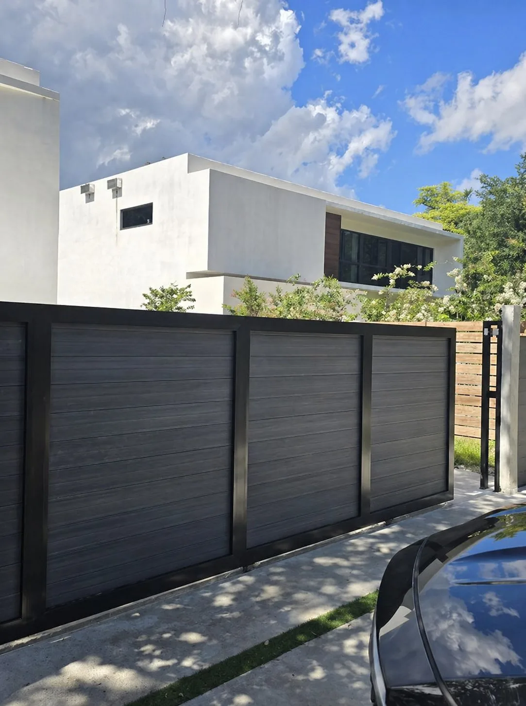Modern aluminum slat fence — Broward County premium installation