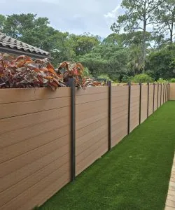 Wood-grain composite privacy fence detail